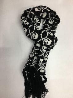 Scare away the cold with this Punk Skull Scarf! Take on the chill with fearless style. This Punk Skull Scarf will keep you warm and add a daring edge to any outfit! Scarf Size: Length: 180cm including Tassels, Width: 15cm Description: Scarf Type: Scarf, ShawlScarf Length: >175cmProcess: KnittedPattern Type: GeometricOrigin: CNMaterial: AcrylicItem Type: Scarves Crochet Scarf Skull, Yana Core, Goth Scarf, Grunge Scarf, Cute Scarves, Scarf Aesthetic, Cute Scarf, Oc Design, Punk Skull