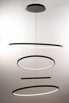 a circular light fixture hanging from the ceiling