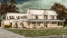 a large white house sitting on top of a lush green field under a cloudy sky