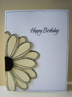 a birthday card with a flower on it