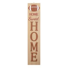 a wooden sign that says home sweet home with a football on it and the words