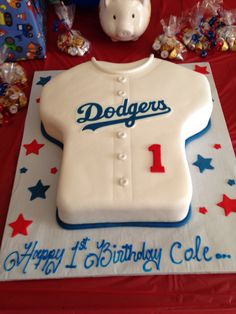 a birthday cake that is shaped like a baseball jersey