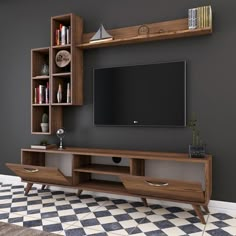 an entertainment center with bookshelves and a flat screen tv mounted on the wall