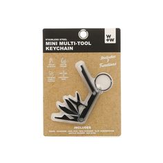 the mini multi - tool keychain is in its package