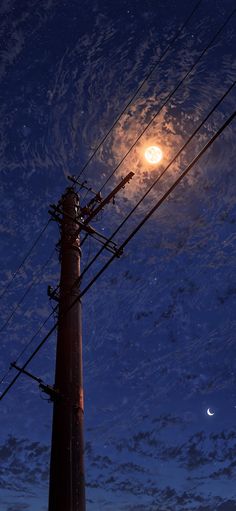 the full moon is seen above power lines and telephone poles at night in this photo