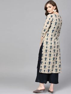 Grab this beautiful Biege & Blue Cotton Abstract Print A Line Kurta crafted from soft beige and blue cotton, this A-line kurta features an intricate abstract print and delicate thread work. The design is accentuated by a flattering pleated style, combining elegance with comfort for a stylish ethnic ensemble. Embrace the charm of print detailing, perfect for adding a pop of personality to any outfit. Single Piece Fabric: Cotton Color: Beige & Blue Neck: Round Neck Sleeve: 3/4th Sleeves Style - A Line Shape with Pleated Style Work Done: Abstract Print & Thread Detailing Length - Calf Length Washing Instructions: Hand Wash Size & Fit - Model's height is 5'8 wearing size small Kurta Sets For Women, Beige And Blue, A Line Kurta, Stylish Pants, Soft Beige, Thread Work, Womens Size Chart, Top Fabric, Single Piece