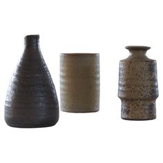 three vases are shown in different shapes and sizes