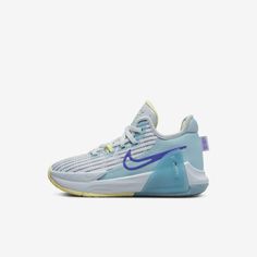 the nike zoom basketball shoe is shown in light blue and white with a yellow sole