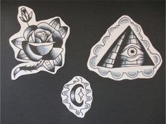 two stickers with different designs on them, one has an eye and the other has a rose