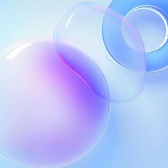 two soap bubbles floating in the air on a blue and pink background with white circles