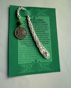 "Irish Bookmark. Give the Legend of An Táin Bó Cúailnge to a reader or student with Irish DNA The coin is an old Irish circulated schilling (Random Year) and it's paired with a Connemara Marble Bead. The Bookmark is Celtic Scroll with Shamrock and the Obverse of the coin shows the Brian Boru Harp. Choose a Genuine Piece of Irish History for an unusual Unisex Gift. The Harp The Gaelic Harp features on the reverse of Irish coins to this day. The Harp has been revered in Irish culture since Henry V Brian Boru, Guinness Brewery, Celtic Legends, Irish Mythology, Connemara Marble, Irish Christmas, The Harp, Samuel Beckett, Irish Culture