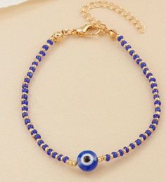 Blue evil eye decor bracelet. Perfect for gifts for her. Blue Bracelets With Round Beads For Fashion, Bohemian Evil Eye Bracelet With Colorful Beads, Elegant Evil Eye Bracelets With Round Beads, Bohemian Evil Eye Bracelet With Round Letter Beads, Trendy Evil Eye Bracelet As Gift, Bohemian Evil Eye Bracelet With Letter Beads, Blue Bracelet Jewelry, Elegant Evil Eye Bracelet With Round Beads, Trendy Blue Jewelry With Tiny Beads