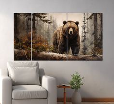 a brown bear standing in the middle of a forest with trees on it's sides