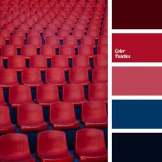 an empty stadium with red chairs and blue seats in the center is featured in this color scheme