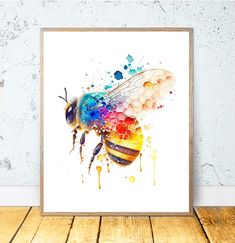 a watercolor painting of a bee on a white wall with wood flooring next to it