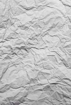 an image of wrinkled paper textured in black and white