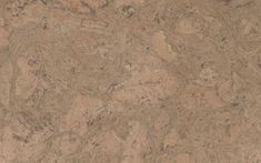 a close up view of the surface of a cork flooring board that is brown and tan