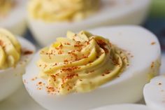 several deviled eggs are sitting on a plate