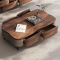 two coffee tables with drawers on each side, one is made out of wood and the other has an open drawer