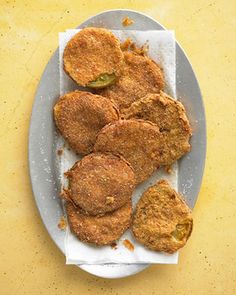 some fried food is on a plate and ready to be eaten