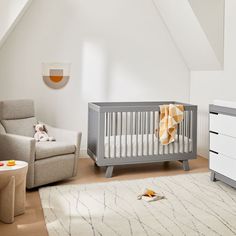 a baby crib in the corner of a room