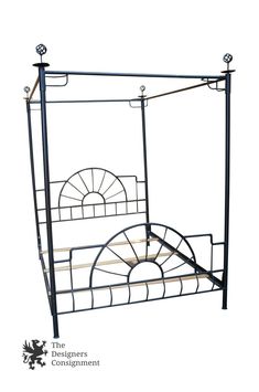 a metal bed frame with an iron headboard and foot board is shown against a white background