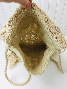 "Vintage macrame purse. Wonderful hippie boho style. This is really from the 1970s, perfect for the vintage lover! Very clean. Size is : 15\" long with fringe x 10\" wide. Total length with strap is 30\"." Cream Bohemian Shoulder Bag For Vacation, Bohemian Cream Shoulder Bag For Vacation, Bohemian Cream Crochet Bag For Vacation, Bohemian Cream Shoulder Bag For Beach, Bohemian Cream Shoulder Bag For The Beach, Beige Bohemian Shoulder Beach Bag, Bohemian Cream Bag For Beach, Bohemian Beige Shoulder Beach Bag, Cream Bohemian Beach Bag