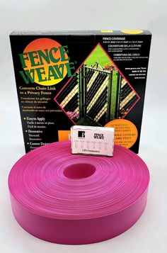 the pink fence tape is in front of a box