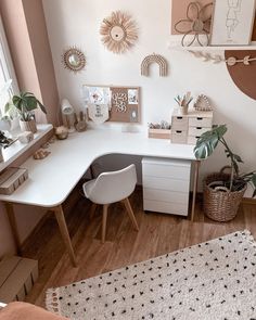 a white desk and chair in a room