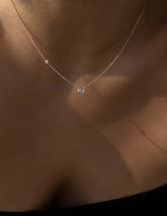 A modern and minimal heirloom necklace that is an ode to the moon and stars. Effortless yet enchanting, it features a luminous oval-shaped Moonstone gem at its centre, accentuated with a sparkling round diamond on one side for a touch of asymmetry. This design was made to honour your connection to the moon and stars that dance radiantly along your neckline.Each Moonstone is unique with its own variation of iridescence and light; a true reflection of nature's nuances that exist within and around Heirloom Necklace, Moonstone Necklace Silver, Hand Jewelry Rings, Moon Necklace Silver, Mini Jewelry, The Moon And Stars, Dainty Necklaces, Anchor Chain, Oval Necklace