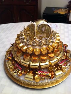 an elaborately decorated cake sits on a table