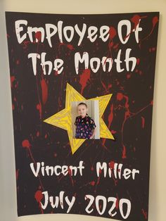 a sign that says employee of the month with an image of a star on it