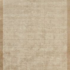 a beige area rug with horizontal stripes on the top and bottom, in two different colors