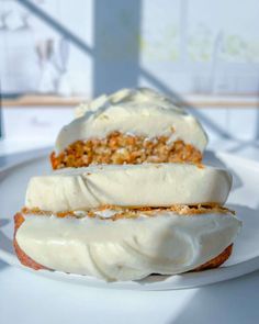 two pieces of cake sitting on top of a white plate