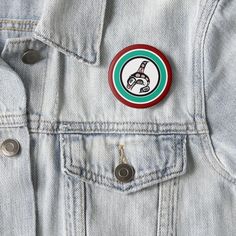 a button that says burgers burritos on the back of a jean jacket