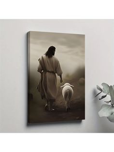 a painting of jesus walking with his sheep