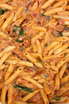 the pasta dish is prepared and ready to be served in the pot or oven,