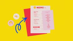 the menu is next to some scissors and a pair of eyeglasses on a yellow background