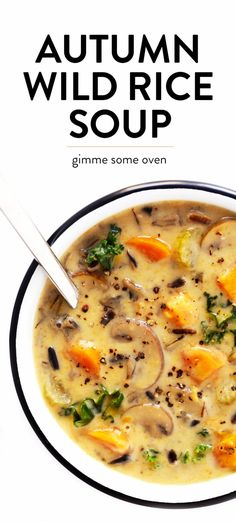 a bowl of soup with mushrooms, carrots and broccoli in it on a white background