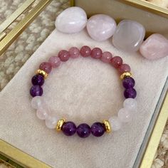 Hello! Welcome to Metrik Jewellery, thank you so much for being here and supporting my small business!  As a female entrepreneur, I am very happy and proud to present my designs to you! Your satisfaction is my number one priority in this store! Details:  - This ' Attract Love 'Bracelet is made of the following raw crystals: 8mm Amethyst, Rose Quartz and Pink Jade. -While designing this 'Attract Love' bracelet, I chose real raw stones that are most compatible with ' Attract Love '. -This bracelet is designed for you and your loved ones. I hope you love it and it brings you luck! -I hope all your dreams become your reality easily! -I will make your bracelet specifically for you with so much love and care. I would like you to know that the number of raw stones in your bracelet may increase or Manifest Love, Pink Jade, Attract Love, Quartz Pink, Love Spell, Love Bracelet, Love Bracelets, Amethyst Stone, Gemstone Bracelets