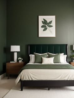 a bedroom with green walls, white carpet and a large bed in front of a painting on the wall