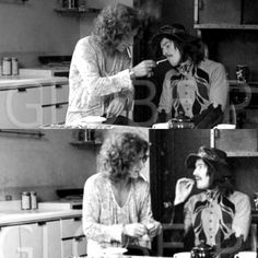 the three men are sitting in the kitchen together