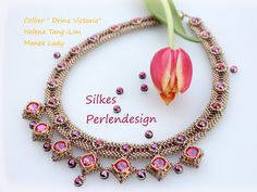 a pink flower sitting on top of a necklace next to a piece of jewelry that says silks perlendesign