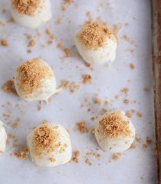 small desserts are arranged on a baking sheet