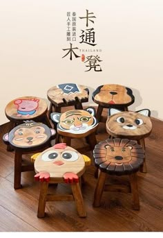 the children's stools are made out of wood and have faces painted on them