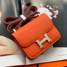 Mini stewardess 14cm orange gold and silver buckle Classic Orange Shoulder Bag With Detachable Strap, Classic Orange Evening Bag, Classic Orange Bag With Gold-tone Hardware, Orange Bags With Palladium Hardware, Luxury Orange Bags With Silver-tone Hardware, Luxury Orange Bag With Gold-tone Hardware, Orange Bags With Silver-tone Hardware, Orange Formal Bags With Gold-tone Hardware, Formal Orange Bags With Gold-tone Hardware