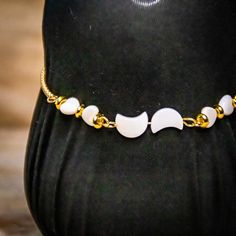 Crescent moon and heart shaped precious pearls sit centred in the middle of a gold metal slider bracelet Slider Bracelet, Pearl Jewellery, Heart Jewelry, Crescent Moon, Pearl Jewelry, Sliders, Crescent, Favorite Jewelry, Gold Metal