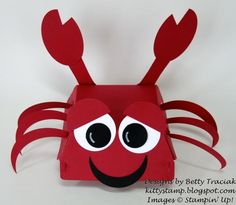 a red crab made out of construction paper