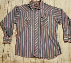 Wrangler Western Shirts Long Sleeve striped Pearl Snaps Size XL Condition is Pre-owned. Shipped with USPS First Class Package Can not see tag size xl 17-17 1/2 Purple with a light denium color Vintage Pearl Snaps, Chistmas Gifts, Western Sleeve, Western Closet, Country Style Outfits, Western Wear Outfits, Rodeo Shirts, Cowgirl Aesthetic, Western Tops