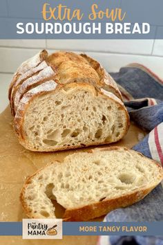 a loaf of sourdough bread sitting on top of a cutting board